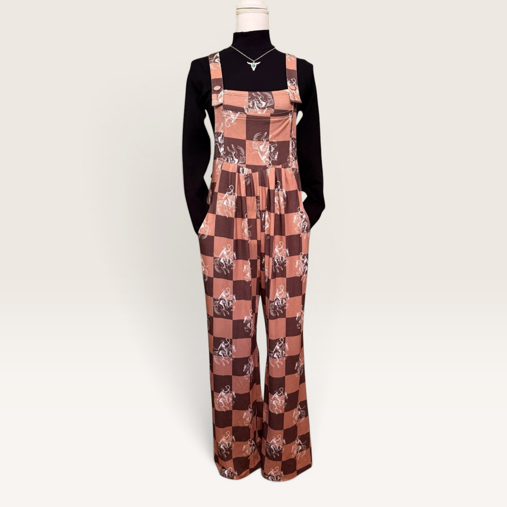 Western horse print overalls layered over black top