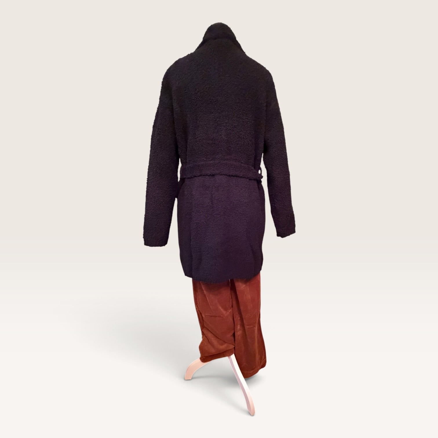 Back view of black long-sleeve knitted cardigan