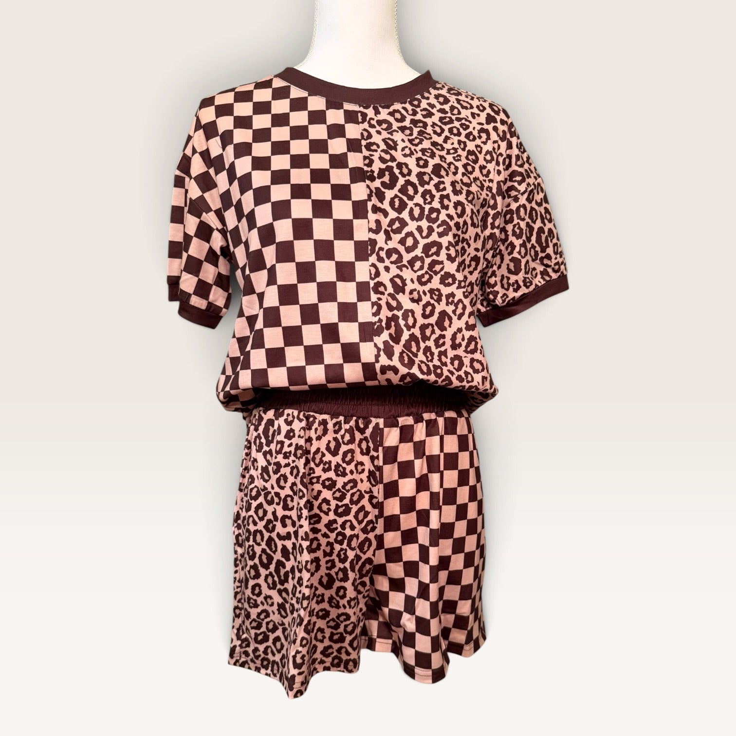 Checkerboard and leopard short set styled on mannequin.