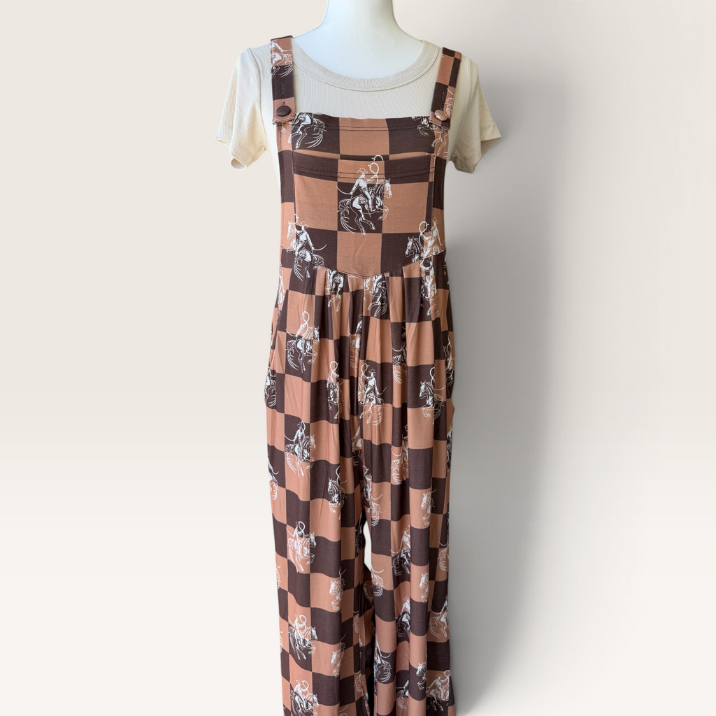 Front view of western checkerboard overalls with horse print