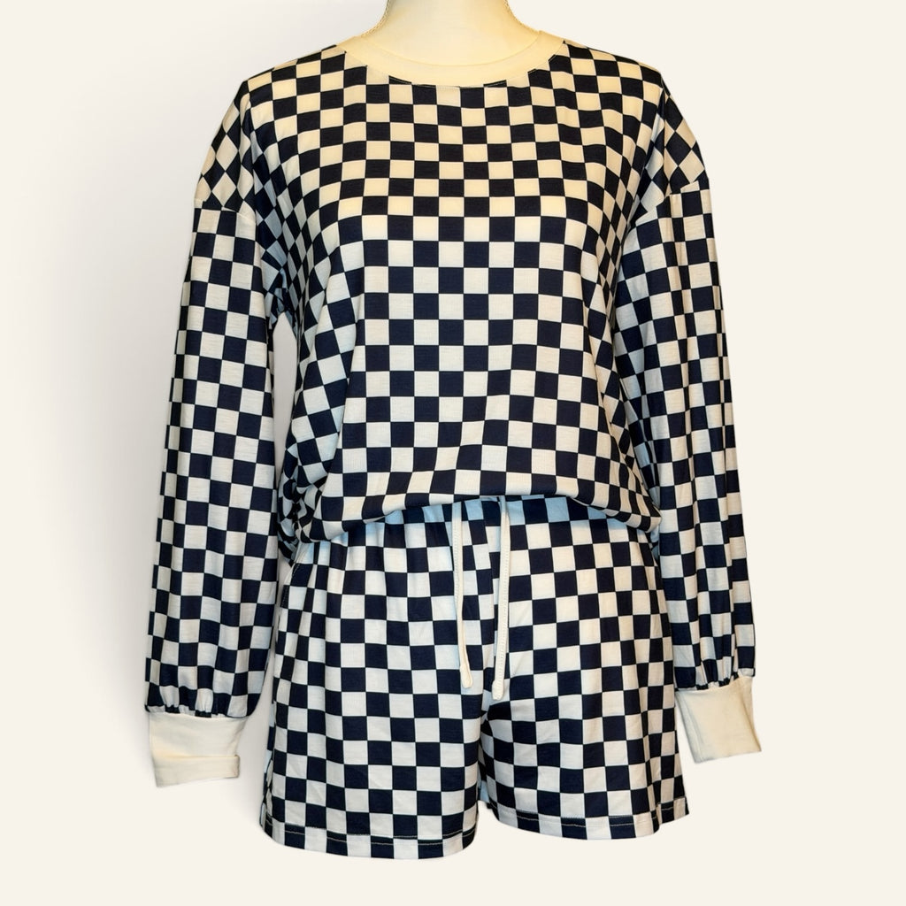 Navy and white checkered two-piece set with long-sleeve top and shorts