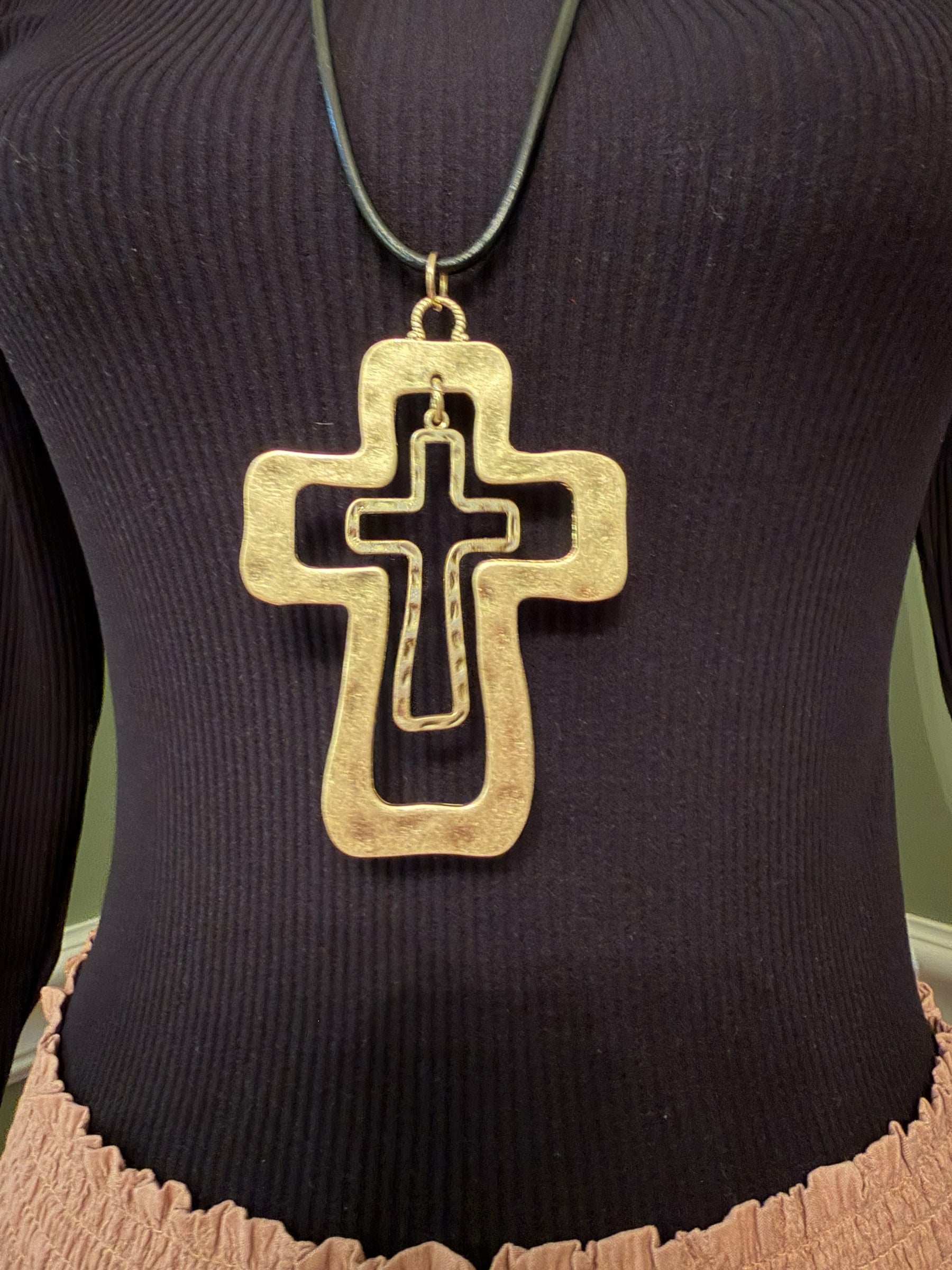 Layered cross necklace with silver-tone and gold-tone details