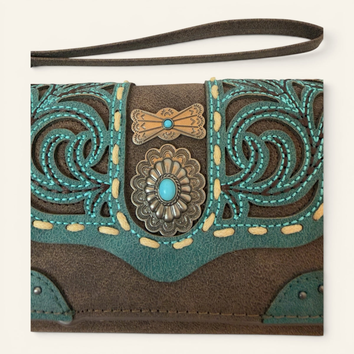 Red Clay Mercantile Western wristlet wallet in chocolate faux leather with teal scrollwork and turquoise concho detail