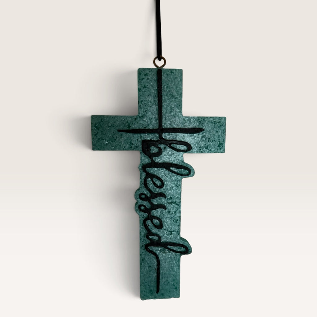 Sadie's handmade Blessed cross car freshie in turquoise with black lettering