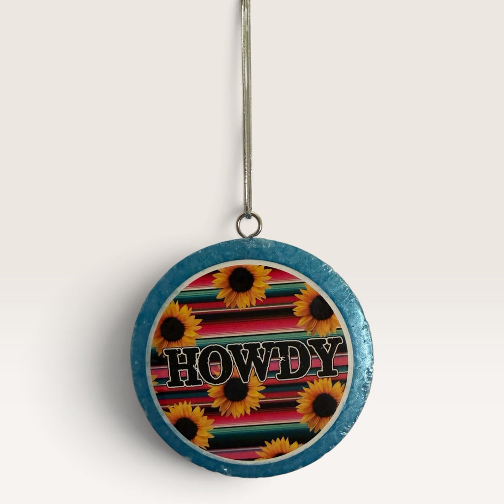 Sadie's handmade Howdy sunflower car freshie with colorful western striped design.